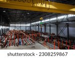 Small photo of Hangar warehouse with metal pipes inside