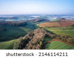 Small photo of Fields and Meadows in the fog over English Village, Berry Pomeroy, Devon, England, Europe