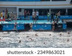 Small photo of ISTANBUL, TURKEY - 2023.08.20: Swimmers at the 35th Samsung Bosphorus Intercontinental Swimming Race. Organized by the National Olympic Committee of Turkey, the 6.5-kilometer race.