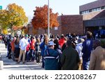 Small photo of Milwaukee, Wisconsin USA - October 29th, 2022: Many Democrat voters lined up at North Division High school to participate at Governor Tony Evers, Mandela Barnes and Barack Obama Democratic party rally