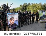 Small photo of Palestinian fighters of the military wing of Palestinian Islamic Jihad, attend a a rally marking Palestinians commemorate Israel's war on Gaza in May last year, in Gaza Strip, on May 18, 2022.