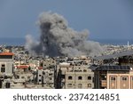 Small photo of Smoke rises after Israeli air strikes near the border east of the city of Rafah in the southern Gaza Strip, on October 12 2023.