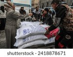 Small photo of Palestinians crowd to receive food supplies at a UNRWA school after some Eur and American countries announced the cessation of support for UN in the Gaza Strip, in Gaza Strip, on January 24, 2024.