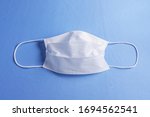 white cotton mask for any virus ... | Shutterstock . vector #1694562541
