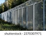 Small photo of Silene, Latvia - September 26, 2023: Latvia - Belarus border, where where a fence with barbed wire has been erected against the refugees from Belarus.