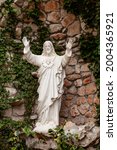 Small photo of Medjugorje Bosnia and Herzegovina : 06.17.2021 : Statue of Jesus Crist in Patrick's and Nancy's Castle.