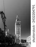 Small photo of Black and white image with a long exposure of the iconic La Giralda tower of the basilica in the centre of Seville.