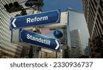 Small photo of Street Sign the Direction Way to Reform versus Standstill