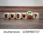 Small photo of Cubes dice with knowledge and knowhow