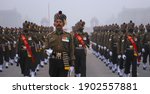 An army contingent march as...