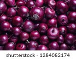 Full Frame Shot Of Purple Onions. Fresh purple onions as a background. 
