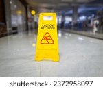 Yellow signs that say wet...