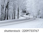 Winding road and frosty landscape