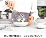 Small photo of Young woman making whipped cream. Delicious food concept. Great design for any purposes.