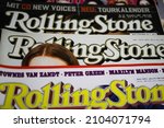 Small photo of Viersen, Germany - May 9. 2021: Closeup of rolling stone paper print music magazine covers (focus on letter g in center)