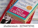 Small photo of Viersen, Germany - March 9. 2023: Closeup of Dale Carnegie bestseller books