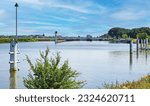 Small photo of Sambeek, Netherlands - June 9. 2023: Large lock sluice facility complex at dutch river Maas (focus on lower third)
