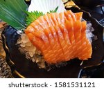Small photo of Salmon sashimi is a basic disk for izakaya