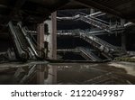 Damaged escalators and waterlogged in abandoned shopping mall building. Structural and ruins was left to deteriorate over time, New World Mall, No focus, specifically.