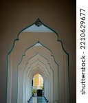 Small photo of Diminishing perspective interior view of inner Bang O mosque hallway leading into outside building. Scenic idyllic, Mosque architecture and art concept, Selective focus.