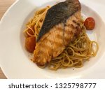 spaghetti with grilled salmon | Shutterstock . vector #1325798777