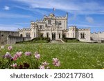Small photo of Condette, France - May 10, 2023: Hardelot Castle is located near Boulogne-sur-Mer. The castle was built by Count Philippe Hurepel of Clermont in 1222. It has a 'pseudo Gothic' style and gardens.