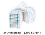 Small photo of Stacks of adult diapers isolated on white background. Health care for elderly and bedridden people with urinary incontinence