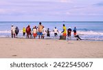 Small photo of Cartagena, Bolivar Colombia - 1 February 2024: The fishermen of Cartagena finish collecting the trammel on the seashore and then go to the sea.