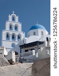 Small photo of Pyrgos Santorini Greece August 30 2018 Aghia Theodosia Church built in 1639
