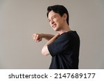 Small photo of Japanese man complaining of neck pain