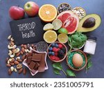 Small photo of Foods for healthy thyroid. Variety of natural healing foods that nourish the thyroid gland. Assortment of natural products to boost thyroid health. Concept of diet, super food for thyroid health.