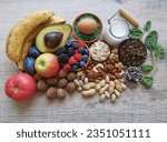 Small photo of Serotonin, dopamine and brain boosting foods. Assortment of food for good mood, happiness, better memory, positive mind. Healthy foods that may help boost serotonin. Natural food sources of serotonin.