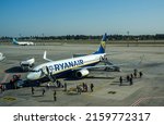 Small photo of BORYSPIL UKRAINE - OCTOBER 3 2021: Passengers disembarking from the aircraft Ryanair company at Boryspil International airport, Ukraine. Ryanair is the biggest budget low-cost airline in the world