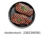 Small photo of Grilled Top Blade or flat iron beef meat steaks. Isolated on white background