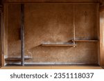 Small photo of A tiered shelf in the alcove of an old Japanese house