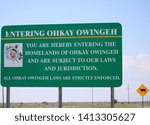Small photo of Sign at the Enterance of the Ohkay Owingeh Native Tribe: "You are Hereby Entering the Homelands of the Ohkay Owingeh and are Subject to Our Laws and Jurisdiction," Alcalde, NM/USA (June 1, 2019)