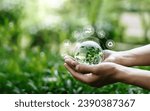 Small photo of Hands protection globe on nature background with icon Environmental, renewable, sustainable energy, CO2, net zero, and ESG concept for low or neutral carbon. Ecology and Environment concept