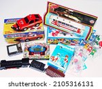 Small photo of Brazil, MS, Dourados, December 18, 2021. Selective focus. Here we see several Brazilian toys: fire engine, bus, train, minigame, TV and colorful plastic dolls. Representing an exhibition of old toys.