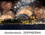 Sydney Harbour Bridge New Years Eve fireworks, colourful NYE fire works lighting the night skies with vivid multi colours. Sydney fireworks