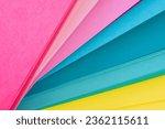 Colored paper in bright tones and spread out