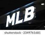 Small photo of Shanghai,China-Feb. 25th 2023: MLB (Major League Baseball) brand logo store sign close up