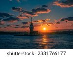 Small photo of Awesome sunset at Maiden Tower. An iconic landmark on Istanbul's skyline, the Maiden's Tower has a rich history dating back to the fourth century, as well as a few legends.