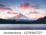 Mount Hood reflecting in Lost Lake at sunrise, in Mount Hood National Forest, Oregonstate. USA. Nature background concept.