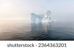 Small photo of Antarctica, South Georgia Island. A lonely glacier. Blue glaciers in the ocean water. Glacial drift on calm water. Clean chunks of ice from a melting glacier. Global warming concept climate change.