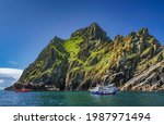 Cruise boats with tourists docking to Skellig Michael island, where Star Wars were filmed, UNESCO World Heritage, Ring of Kerry, Ireland
