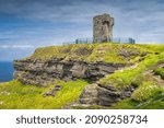 Small photo of Old Moher Tower on Hags Head, watchtower at the southern end of Cliffs of Moher, popular tourist attraction, Wild Atlantic Way, County Clare, Ireland