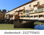 Small photo of The historical Ponte Vecchio bridge over the Arno River in Florance