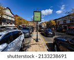 Small photo of MADISON, UNITED STATES - Oct 14, 2021: A welcome to Madison sign of Madison, New Jersey downtown on a sunny afternoon