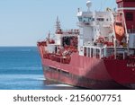 Small photo of SINES, PORTUGAL - May 04, 2022: A view of the "Helena Kosan" ship moored in a harbor in Sines, Portugal
