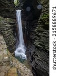 Small photo of A vertical shot of a waterfall at Watkins Glen State Park, Finger Lake region, upstate New York, USA